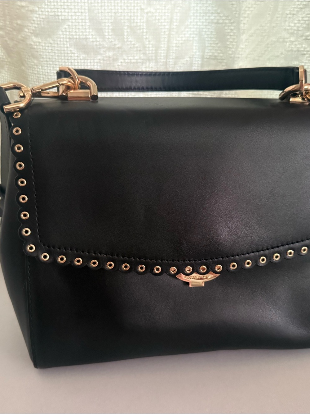 Elegant Black Leather Shoulder Bag with Gold Accents